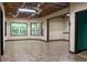 Spacious basement with large windows and neutral flooring at 430 English Ivy Way, Woodstock, GA 30188