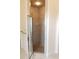 Bathroom showcasing a walk-in shower with glass door and tiled walls at 430 English Ivy Way, Woodstock, GA 30188