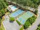 Aerial view of community amenities including pool, tennis court, basketball court, and parking at 795 Creek Glen Rd, Mableton, GA 30126
