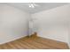 A bright bedroom with a ceiling fan, hardwood floors, and a walk-in closet at 795 Creek Glen Rd, Mableton, GA 30126