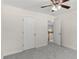 Bedroom with a closet and a doorway leading to the hallway, enhancing accessibility at 795 Creek Glen Rd, Mableton, GA 30126