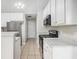 Efficient kitchen layout with modern appliances and plenty of counter space for meal preparation at 104 Terrapin Ct, Carrollton, GA 30116