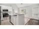 Functional kitchen with stainless steel appliances, ample storage, and a convenient breakfast bar at 104 Terrapin Ct, Carrollton, GA 30116