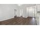 Open-concept living area with updated flooring and natural light, perfect for entertaining at 104 Terrapin Ct, Carrollton, GA 30116