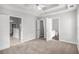 Generous main bedroom with neutral tones, offering a peaceful retreat and en-suite access at 104 Terrapin Ct, Carrollton, GA 30116