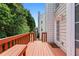 Enjoy outdoor living on this cozy back deck with built-in bench seating at 2061 Pinnacle Pointe Dr, Norcross, GA 30071