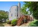 View of the back of the home with a two-story deck and landscaped yard at 2061 Pinnacle Pointe Dr, Norcross, GA 30071