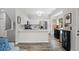 Modern kitchen with white cabinets, stainless steel appliances, and quartz countertops at 2061 Pinnacle Pointe Dr, Norcross, GA 30071