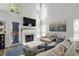 Bright living room with high ceilings, fireplace, large windows and elegant decor at 2061 Pinnacle Pointe Dr, Norcross, GA 30071