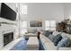 Bright living room with high ceilings, fireplace, large windows and elegant decor at 2061 Pinnacle Pointe Dr, Norcross, GA 30071