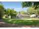 A beautiful home situated on a sprawling lawn with mature trees at 3519 Oak Knoll Dr, Marietta, GA 30068
