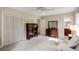 Spacious bedroom featuring two closets, wood furnishings and an en suite bathroom entrance at 3519 Oak Knoll Dr, Marietta, GA 30068