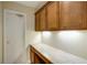 Bright kitchenette features wood cabinets and a granite countertop for food preparation at 3519 Oak Knoll Dr, Marietta, GA 30068