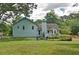 Home with fenced-in backyard featuring a firepit, yard, and patio at 368 Lambeth Dr, Hiram, GA 30141