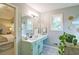 Charming bathroom features a stylish vanity, modern flooring, and plenty of natural light at 368 Lambeth Dr, Hiram, GA 30141