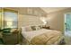 Bright bedroom features a comfortable bed, neutral tones, and ample natural light at 368 Lambeth Dr, Hiram, GA 30141