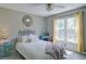 Cozy bedroom features a comfortable bed, neutral tones, and ample natural light at 368 Lambeth Dr, Hiram, GA 30141