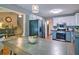 Modern kitchen with stainless steel appliances, an eat-in table, and a view into the adjacent living room at 368 Lambeth Dr, Hiram, GA 30141