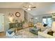 Comfortable living room with vaulted ceiling, a ceiling fan, and a view of the front entrance at 368 Lambeth Dr, Hiram, GA 30141