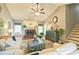 Inviting living room featuring a brick fireplace, hardwood floors, and a comfortable seating arrangement at 368 Lambeth Dr, Hiram, GA 30141