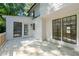 Wooden back deck attached to white home with an exterior view at 4166 Riverhill Ne Ct, Roswell, GA 30075