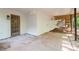 Covered outdoor patio with door to main house and view of backyard at 4166 Riverhill Ne Ct, Roswell, GA 30075