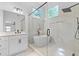 Beautiful bathroom featuring a tub, glass shower, quartz counters, and modern fixtures at 4166 Riverhill Ne Ct, Roswell, GA 30075