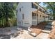 Charming home featuring a side-entry garage, classic shutters, and a welcoming front porch at 4166 Riverhill Ne Ct, Roswell, GA 30075