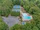 Aerial view of community amenities including tennis courts, a pool, and a parking lot at 4402 Windsor Oaks Chase, Marietta, GA 30066