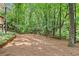 Private backyard features mature trees and room for outdoor enjoyment at 4402 Windsor Oaks Chase, Marietta, GA 30066