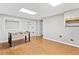 Basement featuring durable wood-look flooring and a foosball table for entertainment at 4402 Windsor Oaks Chase, Marietta, GA 30066