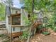 Three level home features many decks and patios for enjoying wooded back yard at 4402 Windsor Oaks Chase, Marietta, GA 30066