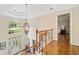 Grand foyer with hardwood floors, a large window, and a view of the front yard at 4402 Windsor Oaks Chase, Marietta, GA 30066