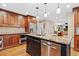 Gourmet kitchen with stainless steel appliances, granite countertops, custom cabinets, and large island at 4402 Windsor Oaks Chase, Marietta, GA 30066