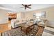 Open-concept living area with hardwood floors, neutral palette, and seamless flow to kitchen at 4402 Windsor Oaks Chase, Marietta, GA 30066