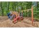 Community playground with slides, monkey bars, and climbing structures nestled in a wooded area at 4402 Windsor Oaks Chase, Marietta, GA 30066