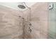 Close-up of a tiled shower with dual shower heads and chrome hardware at 4402 Windsor Oaks Chase, Marietta, GA 30066