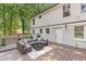 Inviting back deck with comfortable seating area, perfect for outdoor relaxation and entertaining at 2048 Mcafee Rd, Decatur, GA 30032