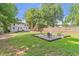 Large backyard featuring a fire pit and a charming deck, ideal for entertaining at 2048 Mcafee Rd, Decatur, GA 30032