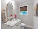 Stylish bathroom featuring vanity with marble countertop, modern fixtures, and updated design at 2048 Mcafee Rd, Decatur, GA 30032