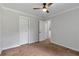 Neutral bedroom with plush carpet and a closet at 2048 Mcafee Rd, Decatur, GA 30032