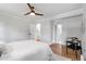 Bright bedroom with hardwood floors, ceiling fan, and updated neutral decor at 2048 Mcafee Rd, Decatur, GA 30032