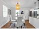 Bright dining area with modern lighting and seating for four at 2048 Mcafee Rd, Decatur, GA 30032