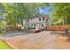 A charming home exterior view with back deck and expansive backyard space at 2048 Mcafee Rd, Decatur, GA 30032