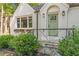 Welcoming front porch with meticulously landscaped yard at 2048 Mcafee Rd, Decatur, GA 30032