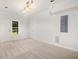 Finished bonus room features a window, two closets and neutral walls and carpeting at 2330 Springmonte Pl, Cumming, GA 30041