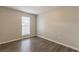This bedroom features hardwood floors and a window at 3151 Kingswood Gln, Decatur, GA 30034