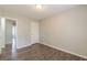 This bedroom features stylish wood flooring and a convenient entry door to enhance accessibility at 3151 Kingswood Gln, Decatur, GA 30034