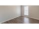 Cozy bedroom with modern paint, hardwood floors, and natural light from the window at 3151 Kingswood Gln, Decatur, GA 30034