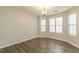 Dining room features new gray flooring, freshly painted walls and lots of natural light at 3151 Kingswood Gln, Decatur, GA 30034